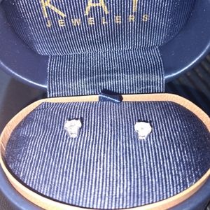 Three quarter carat Leo Diamond earrings